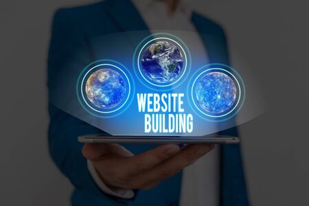 Text sign showing Website Building. Business photo text tools that typically allow the construction of websites Elements of this image furnished by NASAの写真素材