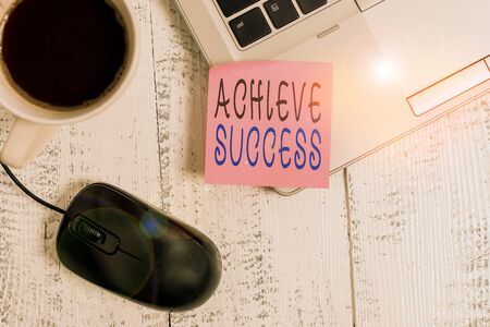 Word writing text Achieve Success. Business photo showcasing to attain a desired end or aim Achievement of something Trendy metallic laptop blank sticky note coffee cup mouse lying vintageの写真素材