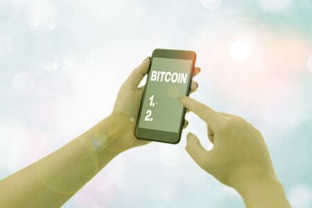 Conceptual hand writing showing Bitcoin. Concept meaning Cryptocurrency Blockchain Digital currency...