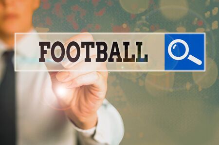 Conceptual hand writing showing Football. Concept meaning any of various forms of team game involving kicking a ballの写真素材
