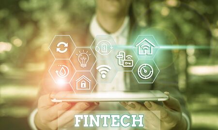 Writing note showing Fintech. Business concept for computer programs and other technology supporting financial servicesの写真素材