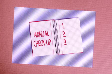 Conceptual hand writing showing Annual Check Up. Concept meaning a thorough physical medical...