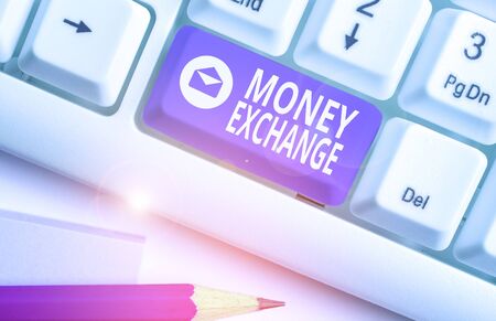 Writing note showing Money Exchange. Business concept for office where you can change one currency into anotherの写真素材