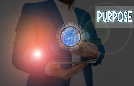 Writing note showing Purpose. Business concept for The reason for which something is done or created and existsの写真素材