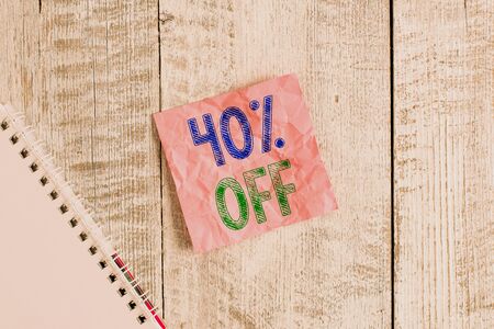 Conceptual hand writing showing 40 Percent Off. Concept meaning 40 percent reduction on the original...
