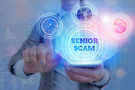 Handwriting text writing Senior Scam. Conceptual photo fraud schemes targeting the lifestyle and savings of the elderlyの写真素材