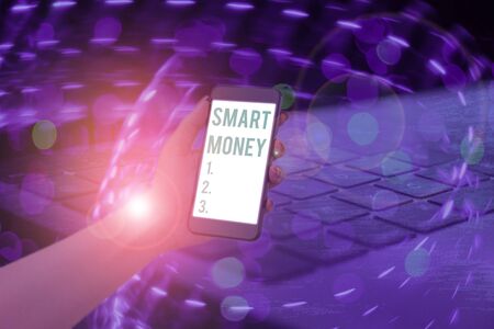 Conceptual hand writing showing Smart Money. Concept meaning the money bet or invested by showing...