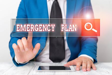 Word writing text Emergency Plan. Business photo showcasing course of action to mitigate the damage of potential eventsの写真素材
