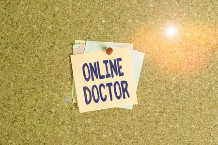 Text sign showing Online Doctor. Business photo showcasing health practitioners deliver services over the internet Corkboard color size paper pin thumbtack tack sheet billboard notice boardの写真素材