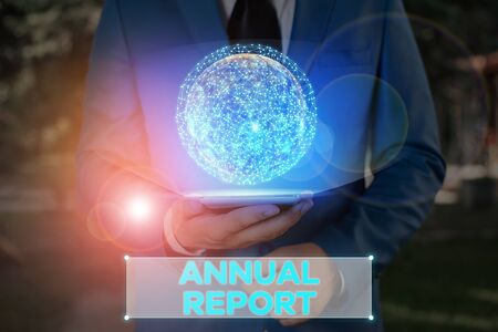 Writing note showing Annual Report. Business concept for financial summary of a company activities during the yearの写真素材