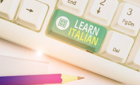 Word writing text Learn Italian. Business photo showcasing gain or acquire knowledge of speaking and writing Italianの写真素材