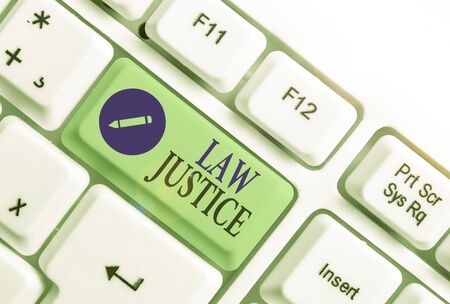 Handwriting text writing Law Justice. Conceptual photo a scheme or system of law in which every demonstrating receivesの写真素材