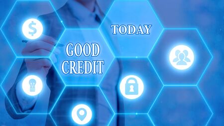Writing note showing Good Credit. Business concept for borrower has a relatively high credit score and safe credit riskの写真素材