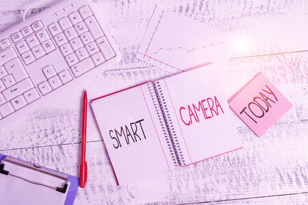 Word writing text Smart Camera. Business photo showcasing individual image processing systems designed to automate Wood desk office appliance computer equipaments chart numbers paper slotの写真素材