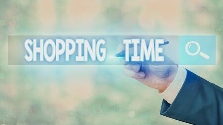 Conceptual hand writing showing Shopping Time. Concept meaning A period of time in which someone buys a lot of thingsの写真素材