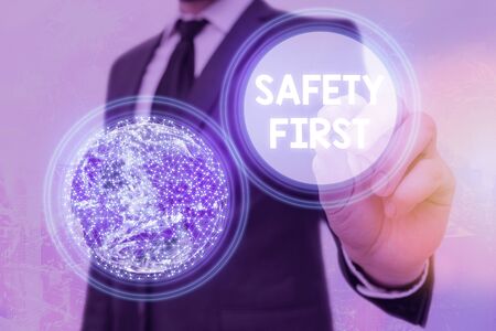 Word writing text Safety First. Business photo showcasing used to say that the most important thing is to be safeの写真素材
