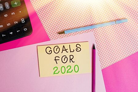 Writing note showing Goals For 2020. Business concept for object of demonstratings ambition or...