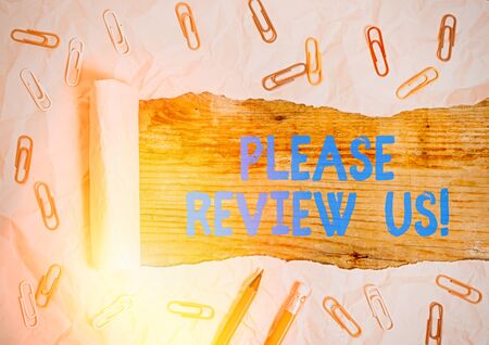Text sign showing Please Review Us. Business photo text situation or system is formal examination by showing authorityの写真素材
