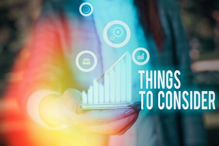 Writing note showing Things To Consider. Business concept for think about carefully especially in making decisionsの写真素材