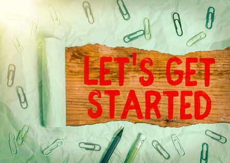 Handwriting text Lets Is Get Started. Conceptual photo to begin doing or working on something you had startedの写真素材