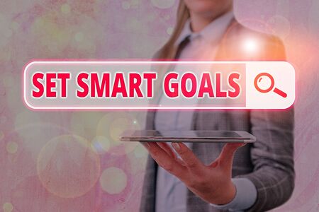 Conceptual hand writing showing Set Smart Goals. Concept meaning list to clarify your ideas focus efforts use time wiselyの写真素材