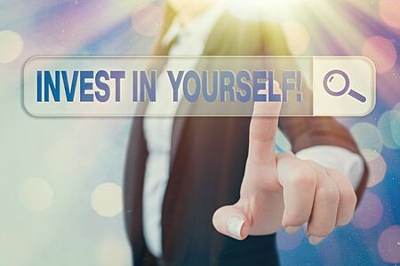 Writing note showing Invest In Yourself. Business concept for nvesting in a coach or a training to learn new thingsの写真素材