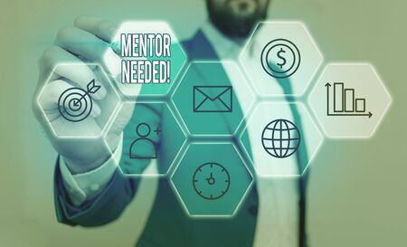 Conceptual hand writing showing Mentor Needed. Concept meaning Employee training under senior assigned act as advisorの写真素材
