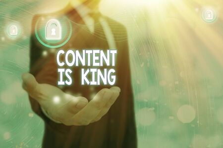 Writing note showing Content Is King. Business concept for marketing focused growing visibility non paid search resultsの写真素材