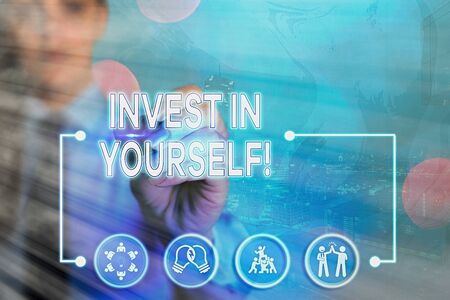 Writing note showing Invest In Yourself. Business concept for nvesting in a coach or a training to learn new thingsの写真素材