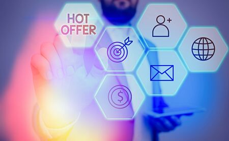 Word writing text Hot Offer. Business photo showcasing product or programme that is offered at reduced prices or ratesの写真素材