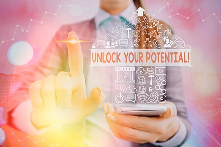 Writing note showing Unlock Your Potential. Business concept for release possibilities Education and good training is keyの写真素材