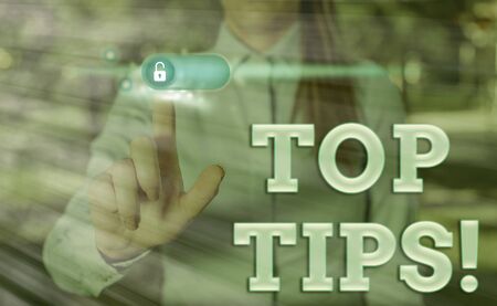 Conceptual hand writing showing Top Tips. Concept meaning small but particularly useful piece of...