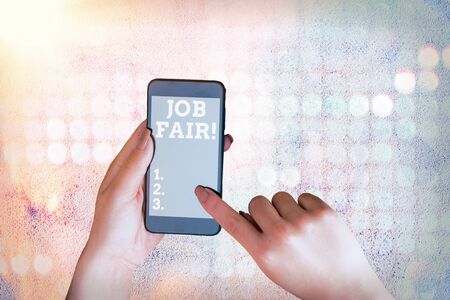 Writing note showing Job Fair. Business concept for event in which employers recruiters give information to employeesの写真素材