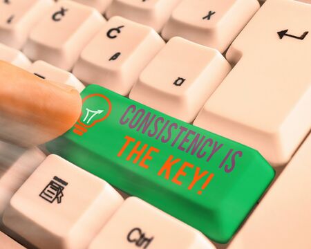 Writing note showing Consistency Is The Key. Business concept for by Breaking Bad Habits and Forming...