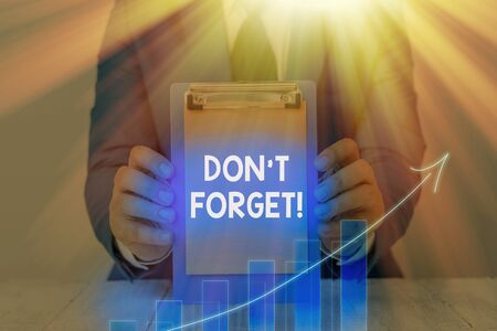 Text sign showing Don T Forget. Business photo showcasing used to remind someone about important fact or detailの写真素材