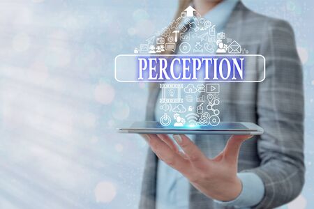 Conceptual hand writing showing Perception. Concept meaning individuals organize and interpret their sensory impressionsの写真素材