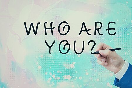 Conceptual hand writing showing Who Are You Question. Concept meaning asking about someone identity or demonstratingal informationの写真素材