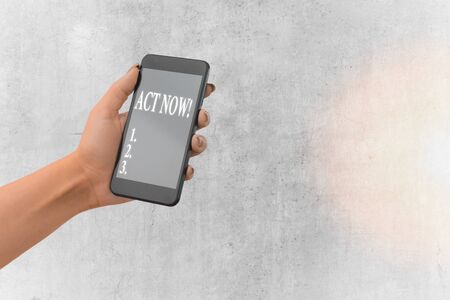 Handwriting text writing Act Now. Conceptual photo fulfil the function or serve the purpose of Take action Do somethingの写真素材