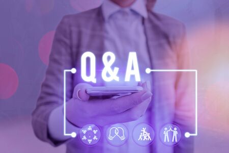 Conceptual hand writing showing Q And A. Concept meaning a period of time or an occasion when someone answers questionsの写真素材