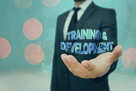 Conceptual hand writing showing Training And Development. Concept meaning learn specific knowledge to improve performanceの写真素材