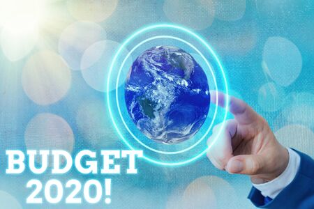 Writing note showing Budget 2020. Business concept for estimate of income and expenditure for...