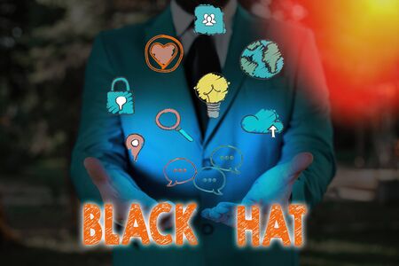 Word writing text Black Hat. Business photo showcasing used in reference to a bad demonstrating especially a villain or criminalの写真素材