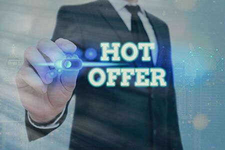 Writing note showing Hot Offer. Business concept for product or programme that is offered at reduced prices or ratesの写真素材
