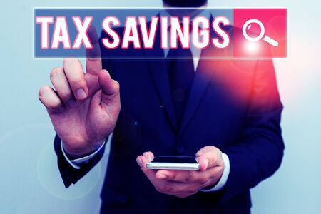 Text sign showing Tax Savings. Business photo text only a portion of income is taxable Pay a reduced amount of taxの写真素材