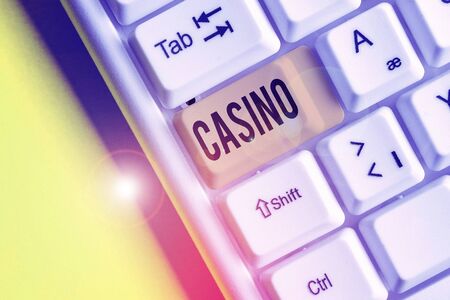 Handwriting text Casino. Conceptual photo a building where games especially roulette and card games are playedの写真素材