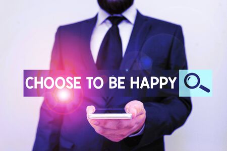 Writing note showing Choose To Be Happy. Business concept for Decide being in a good mood smiley cheerful glad enjoy Male human wear formal work suit hold smartphone using hand