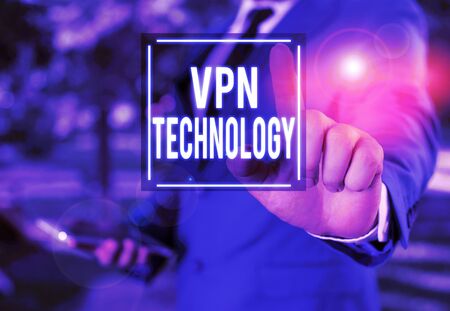 Handwriting text writing Vpn Technology. Conceptual photo programming that creates a safe and encrypted connection Businessman with pointing finger in front of himの写真素材