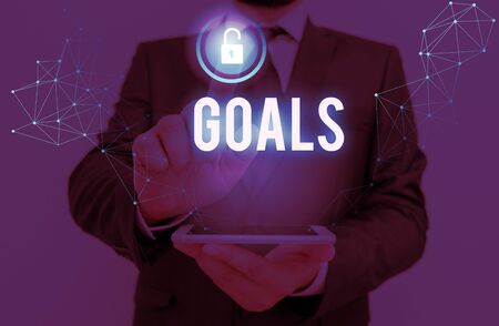 Writing note showing Goals. Business concept for demonstratings ambition or effort aim desired result Sport match Winningの写真素材