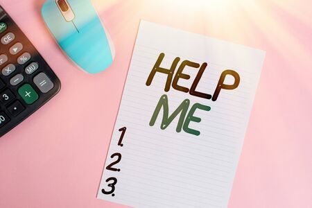 Handwriting text writing Help Me. Conceptual photo Asking someone to assist you Shouting for it Teamwork Volunteer Electronic calculator device wire mouse striped sheet colored backgroundの写真素材