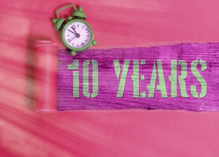 Handwriting text 10 Years. Conceptual photo Remembering or honoring special day for being 10 years in existenceの写真素材